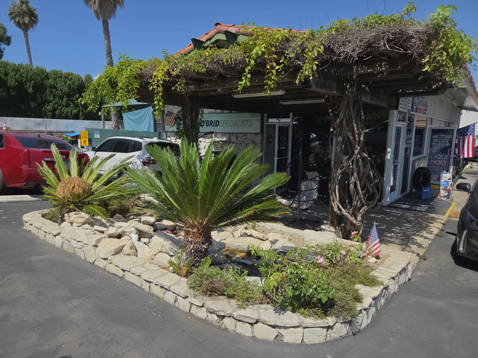 The Hillside Auto Repair shop, landscaped entrance, and customer parking in Torrance